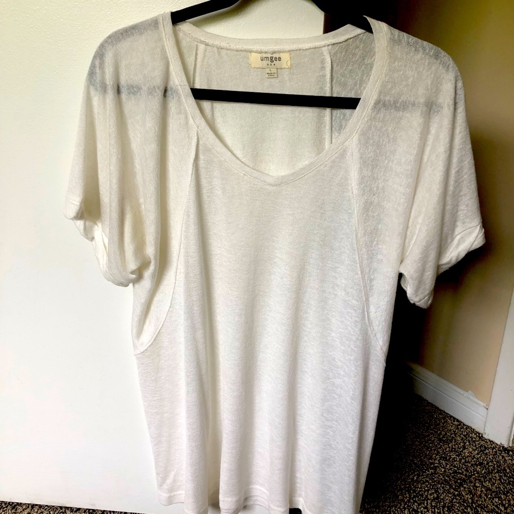 White shirt, soft material, size Large.